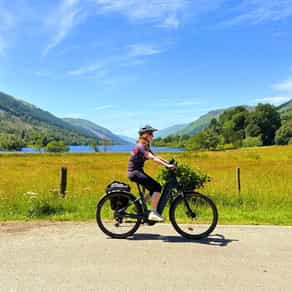 Female cyclist riding in Scotland on a leisure cycling tour